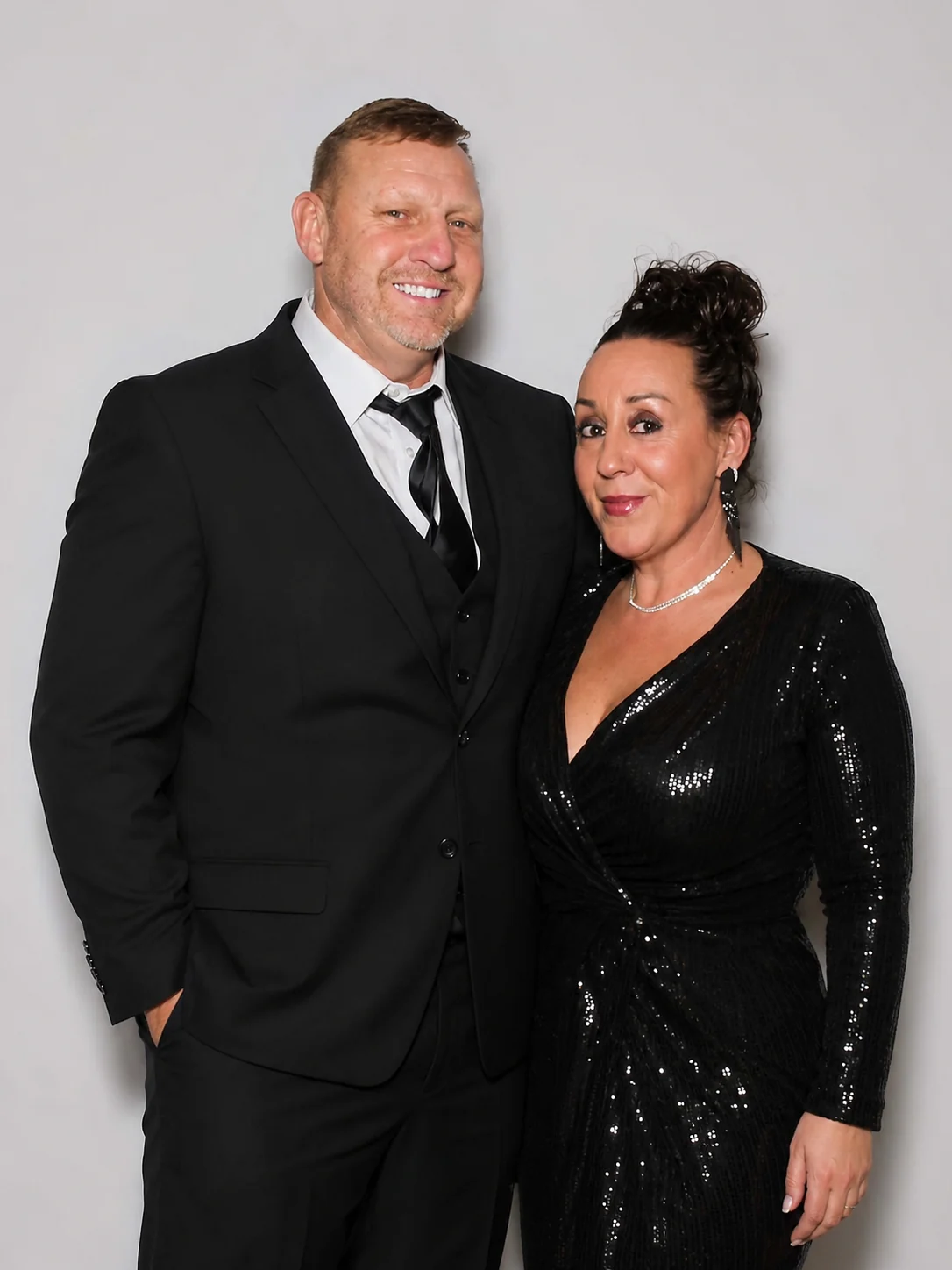 Pallet Pounders owners Vern and Tricia dressed in black
